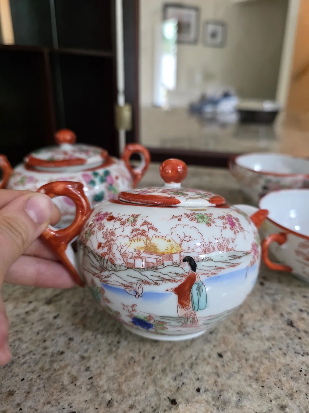 Porcelain Tea Set with Orange Accents